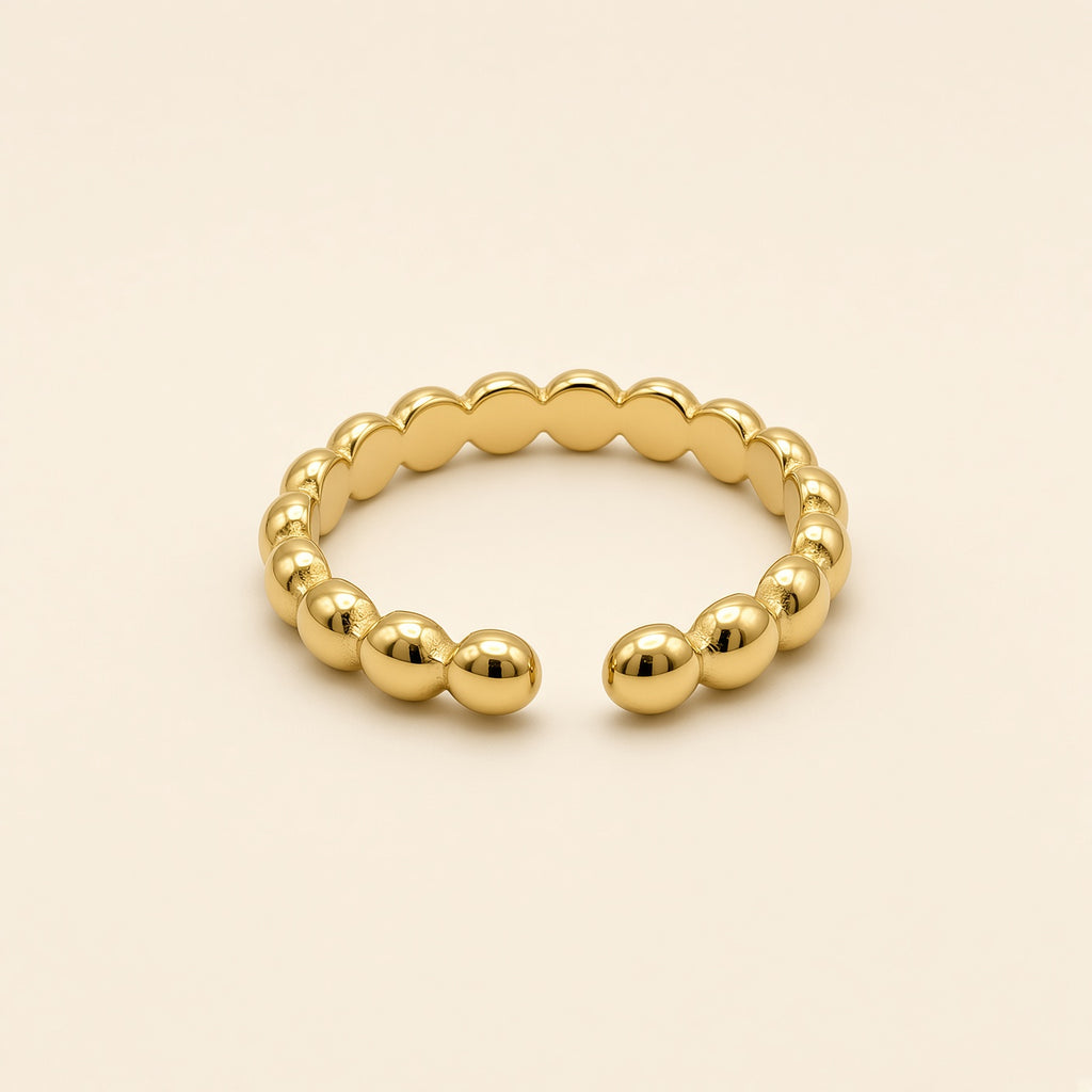 Bague ajustable Nina dorée — vue de face, pois ronds